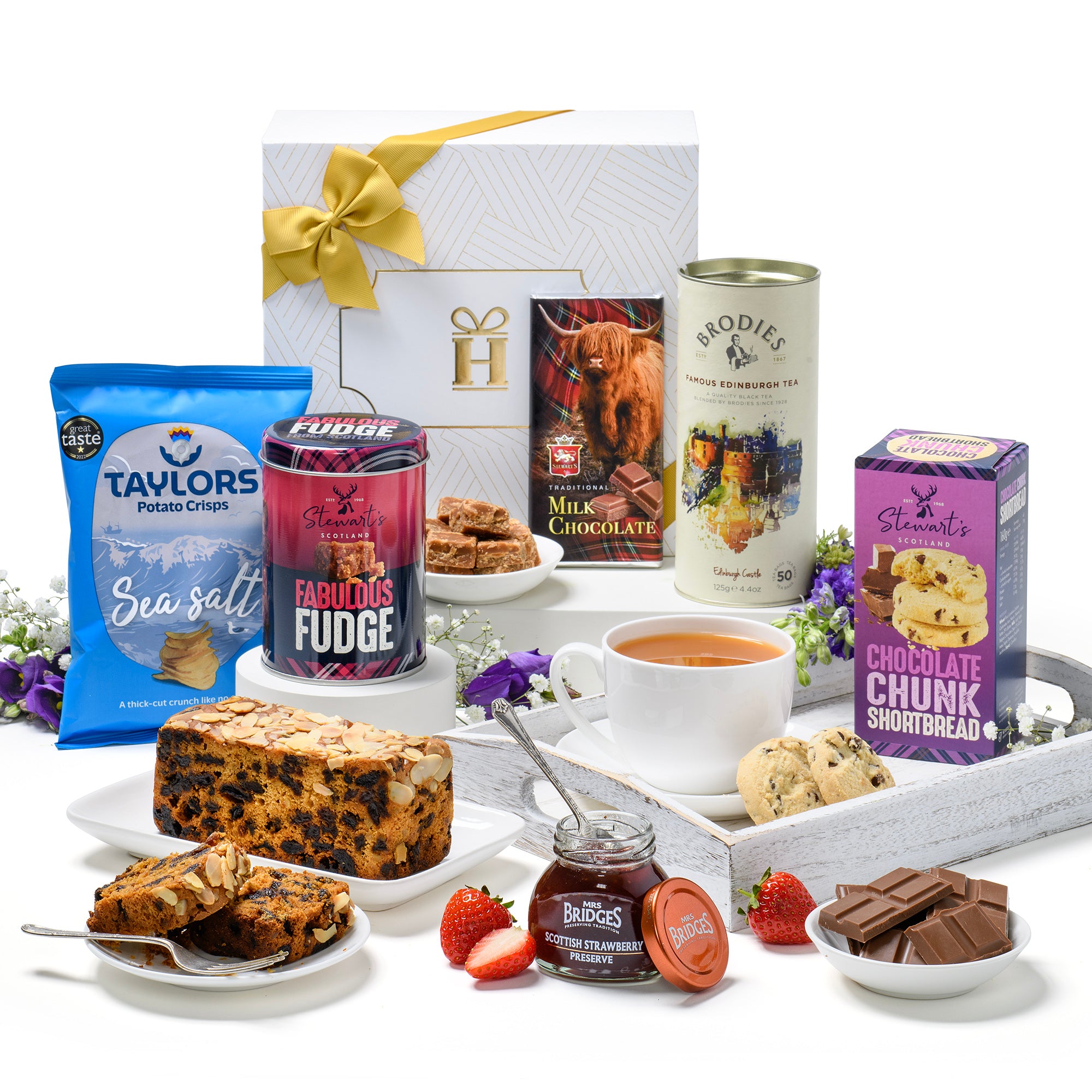 Scottish luxury afternoon tea hamper gift with shortbread, tea, fudge, cake, chocolate, crisps, and jam in magnetic box