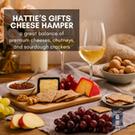 Gourmet hamper box featuring artisan cheese, chutneys, and crackers
