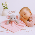 Baby comforter draped over crib in nursery setting – cozy and calming sleep companion for little ones