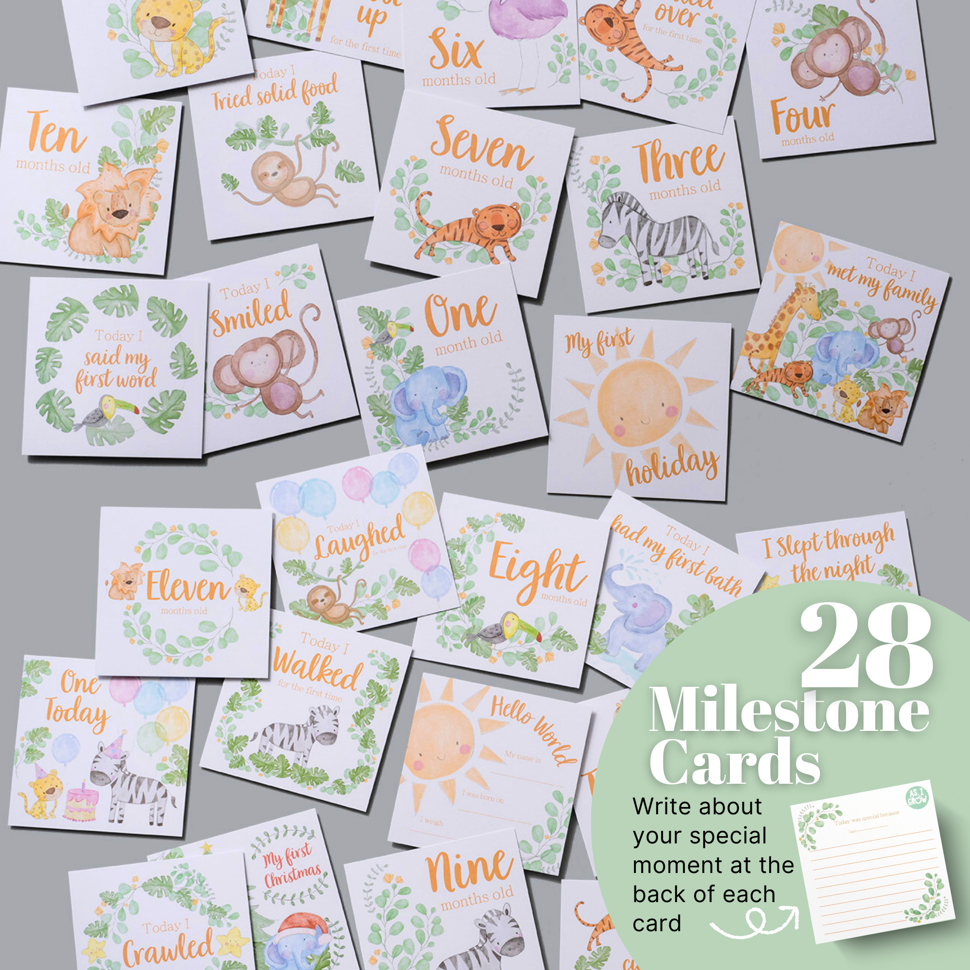 Flat lay of baby milestone cards in safari theme – includes monthly and celebratory designs