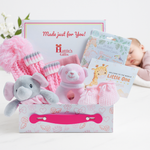 Baby hamper contents arranged inside white magnetic keepsake gift box – beautifully presented and gift-ready