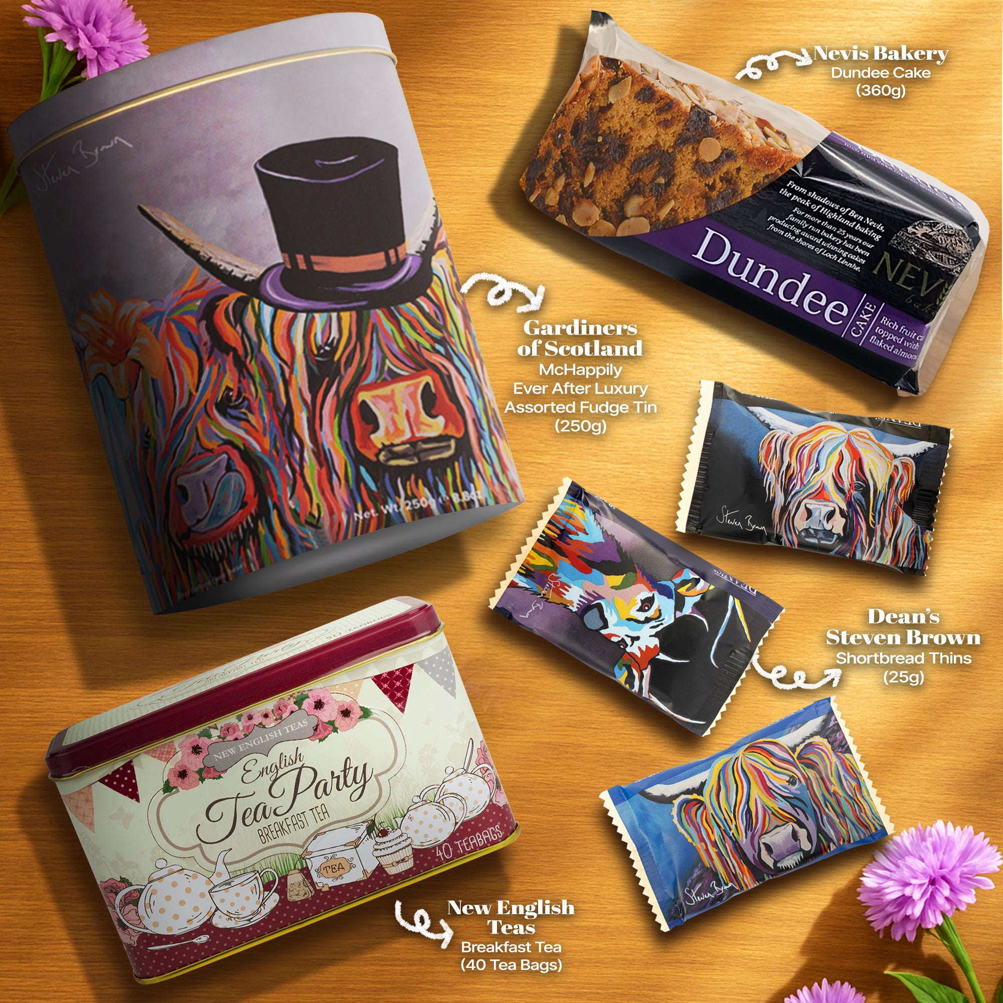 Flat lay of gift hamper contents including McHappily Couple Assorted Fudge tin by Gardiners of Scotland, surrounded by complementary treats—perfectly styled with Hattie’s Gifts white spotty box sleeve