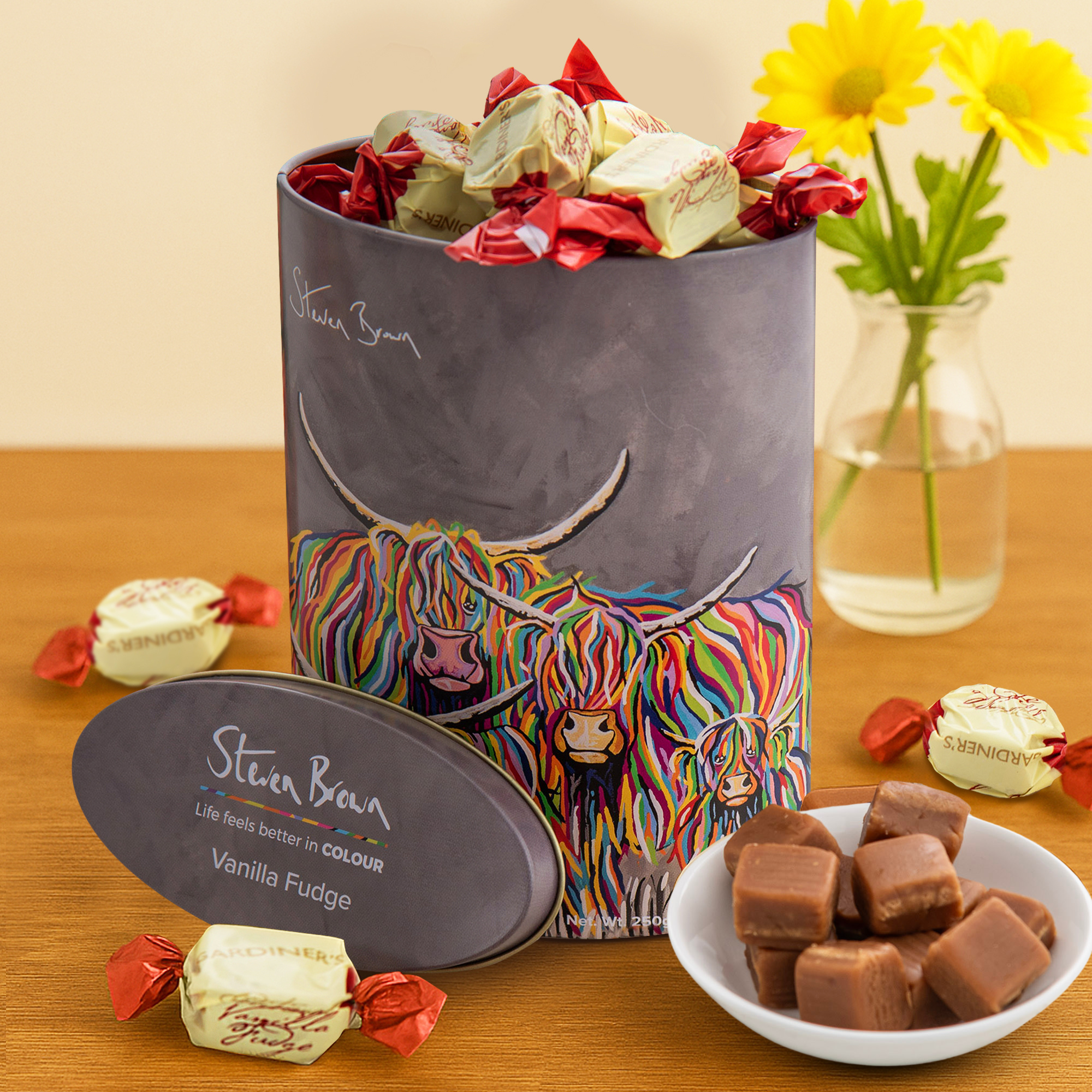 Gardiners of Scotland Ross McCoo Vanilla Fudge tin featuring Steven Brown’s colourful Highland cow artwork
